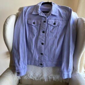 Lavender jean jacket with brass button detail.
